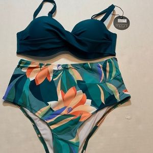 Two piece women swimsuit with floral bottoms